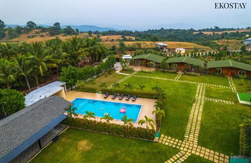 Karjat Villa | EKOSTAY Luxe - Woodstock Villa I 2 Acre Property I Cricket Turf I Party Friendly