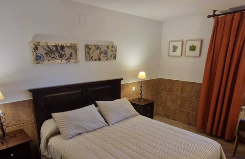 Una Cottage | El Escalerón II House | Accommodation The Toba. Patio, barbecue and fireplace