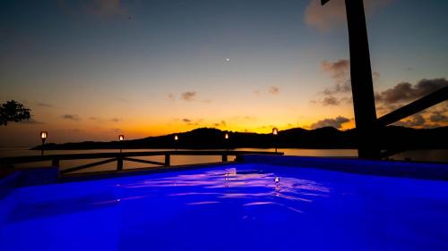 Punta Caribe Apartment | El Palacio Rosa on Blue Lagoon 2BR Beachfront Suite on pristine & quiet bay w incredible views