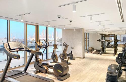 Al Safa Apartment | Elegant 1BR Apt with Balcony Views of Burj Khalifa & Dubai Canal