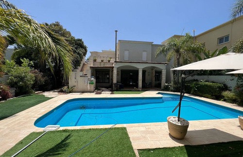 Caesarea Villa | Elegant 5BR Haven with Sparkling Pool & Serene Garden Oasis