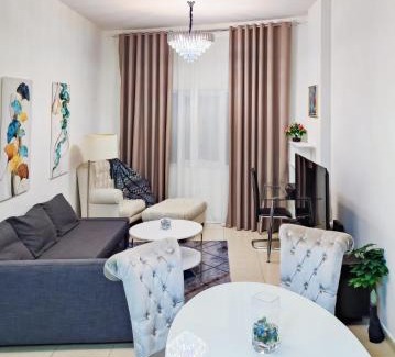 Dubai Apartment | Elegant Fresh 1BR with Heated Pool, just steps from Mall, Restaurants & Fitness center