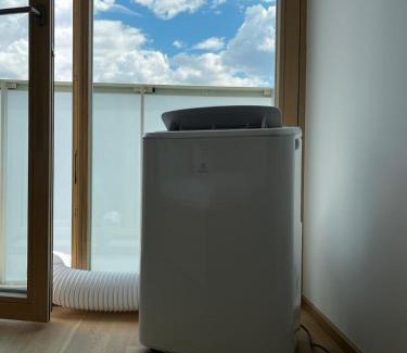 Smichov Apartment | Elegant Prague Flat with Balcony, Workspace, Garage