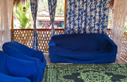 Guwahati House | “Elevated wood cabin and bamboo lounge combo in a lush mountain valley.”