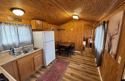 Belfield Cabin | Elkhorn Cabin Summary