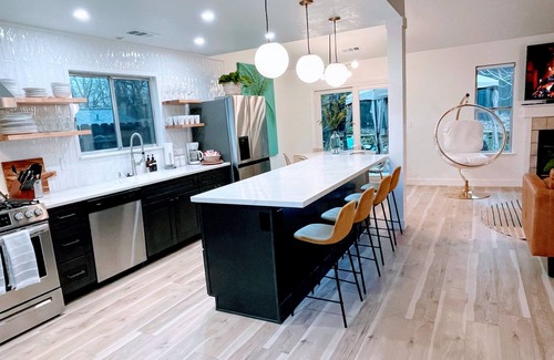 North Hilltop House | Emerald House - striking, remodel in tranquil, central neighborhood