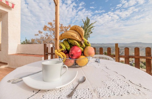 Priego de Cordoba House | Enjoy a unique view of the countryside in this comfortable vacation home with pool.