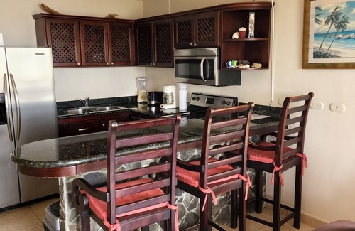 Barrio Los Villalobos Condo | Enjoy the beach view while sitting on the lanai