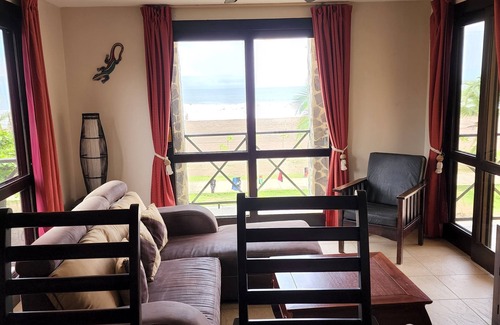 Barrio Los Villalobos Condo | Enjoy the beach view while sitting on the lanai