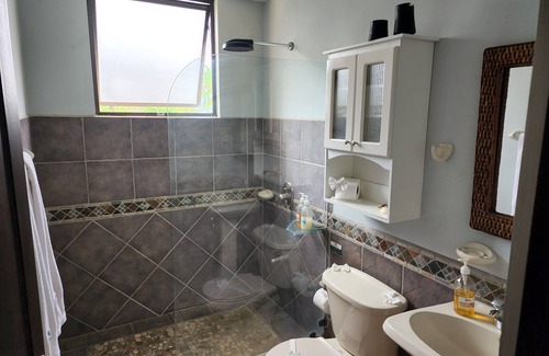 Barrio Los Villalobos Condo | Enjoy the beach view while sitting on the lanai