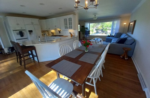 Powers Lake House | Enjoy this updated home just steps from the sandy beach in Powers Lake.