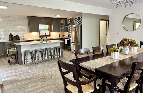 Oskaloosa House | Entertain Large Groups Here: Game Room, Pool, Patio, Fire Pit, Pool Table & More