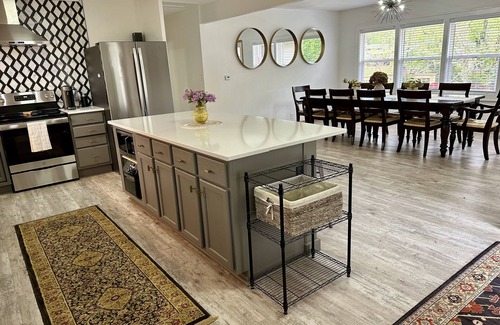 Oskaloosa House | Entertain Large Groups Here: Game Room, Pool, Patio, Fire Pit, Pool Table & More