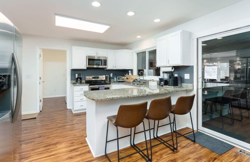 Bridgman House | Epic Indoor Pool w/slide & hot tub close to beach