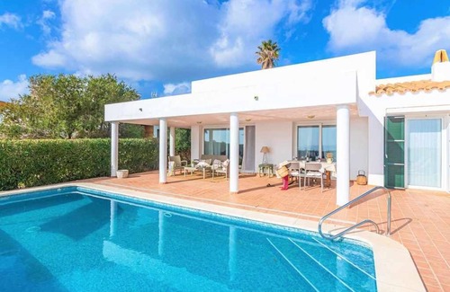 Sant Lluis Villa | VILLA TURQUESA - Stylish large, bright villa near the beach, sea views