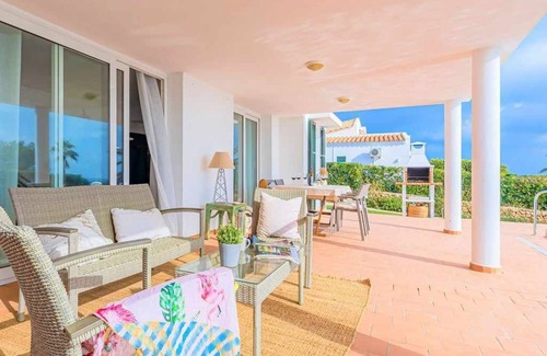 Sant Lluis Villa | VILLA TURQUESA - Stylish large, bright villa near the beach, sea views