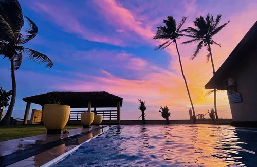 Boossa Villa | Escape to a Coastal Paradise: Your Perfect Getaway by the Beach!