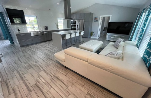 Lakeside Estates House | Escape to Paradise!Luxury Waterfront Heated Pool House in Tranquil Neighborhood!