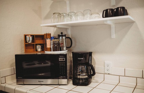 Phoenix House | Escape to this artsy 2-bedroom MCM Guesthouse in charming Phoenix, OR. Unwind in the luxurious spa soaking tub after exploring Southern Oregon. Features high-end design for a stylish, quiet retreat.