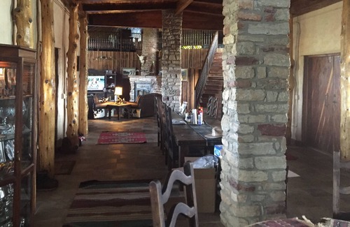 Mulhall House | Experience a cabin by the pool, at a straw-bale house, powered by solar panels.