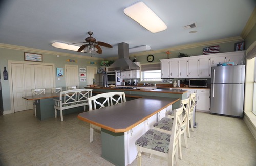 Grand Isle House | Experience beachfront luxury at Orange Beach Retreat in Grand Isle, LA, perfect for 16 guests.