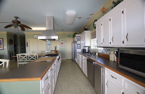 Grand Isle House | Experience beachfront luxury at Orange Beach Retreat in Grand Isle, LA, perfect for 16 guests.