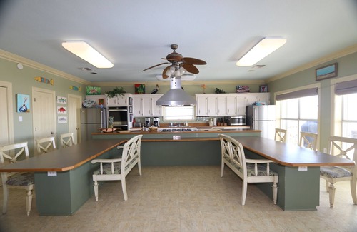 Grand Isle House | Experience beachfront luxury at Orange Beach Retreat in Grand Isle, LA, perfect for 16 guests.