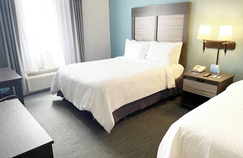 West Kissimmee Hotel | Experience The Magic of Orlando- 2 Rooms W/Free Shuttle, 5 Pools, and Breakfast