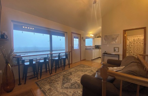 Cobden Cabin | Exquisite views of Shawnee National Forest seen from a private, covered hot tub.