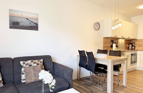 Thiessow Apartment | F: Haus Düne Whg. 03 with fireplace & south/west terrace & balcony - Haus Düne Whg. 03