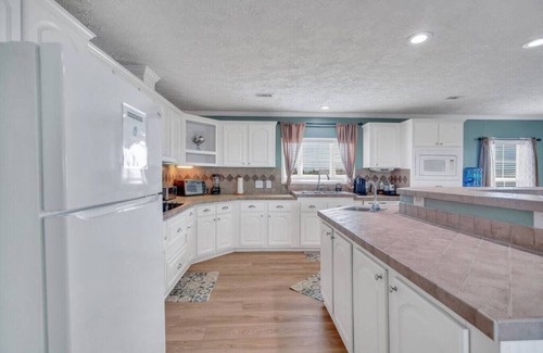 Lake Catherine House | Family Friendly Waterfront Home | Private backyard