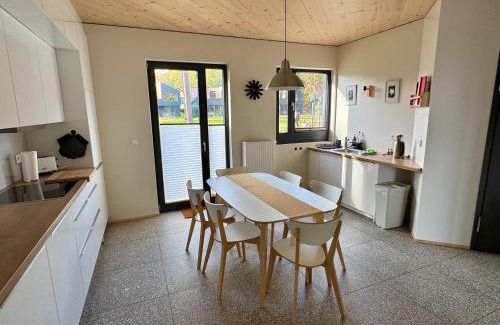 Postheim House | Ferienhaus Haus 11 in Templin mit Seeblick und Sauna