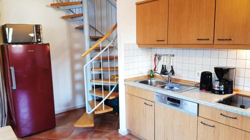 Neuensien Apartment | Ferienwohnung 15 im Fischerhaus mit Balkon