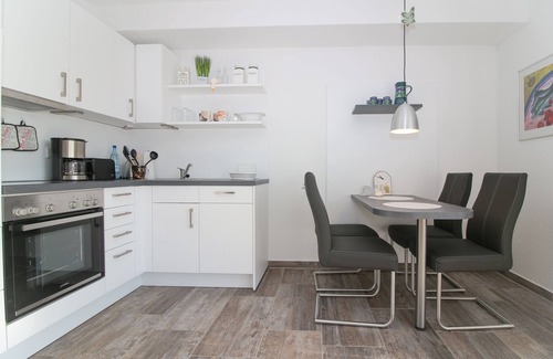 Norden Apartment | Ferienwohnung im Erdgeschoss für 2 Personen mit Terrasse und Garten in Norden