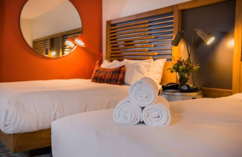 Live Oak Hotel | Fireside Fantasy: 2 Cozy Rooms with Pool Access & Santa Cruz Nature Trails