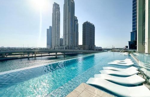 Mirdif Apartment | FIRST CLASS 2BR Luxury Canal & Pool Views