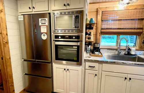 Pawleys Island Cabin | ‘First tiny home in Pawleys Island! Cozy porch + Steps from Golf & Beach.”