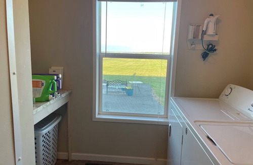 Cambridge House | Fish, kayak, bike, and more at this private serene 24-acre waterfront estate.