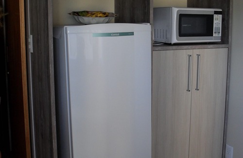 Embare Apartment | Fit 1 bedroom with panoramic view of the beach, Wi-Fi, Gar. Collective, Embaré (channel 4)