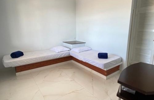 Ubu House | FRENTE MAR CASTELHANOS Casa Recanto Azul 7 Suítes Lazer Completo e Conforto recém reformada para Até 25 Pessoas Ideal para reunir Famílias e Amigos