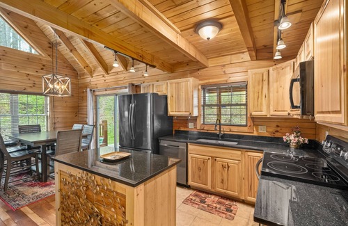 Logan Cabin | Frontier for Families-Secluded-Covered Hot Tub-Game Room-3 CoveredDecks-Fire Pit