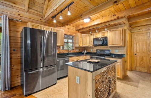 Logan Cabin | Frontier for Families-Secluded-Covered Hot Tub-Game Room-3 CoveredDecks-Fire Pit