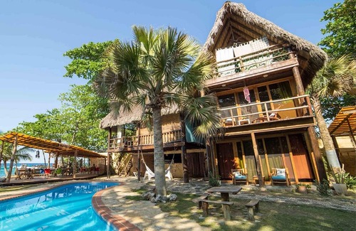 Cabarete Villa | Full beachfront resort of 16 bedrooms, with large treehouse, perfect for parties
