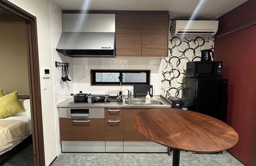 Chuo-ku House | Full kitchen with private sauna & open-air bath. A space that makes you forget about time!