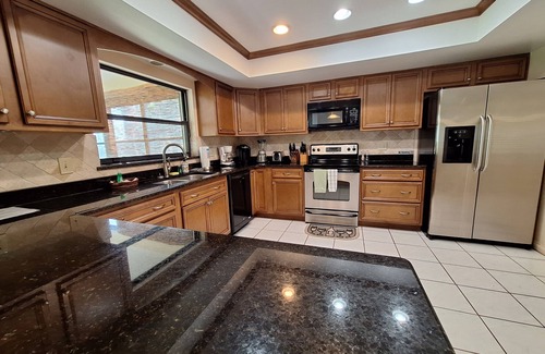 Oviedo House | Gator Den: Comfortable 3-bedroom, 2-bath home, sleeps 6. Ideal for mid-sized groups.