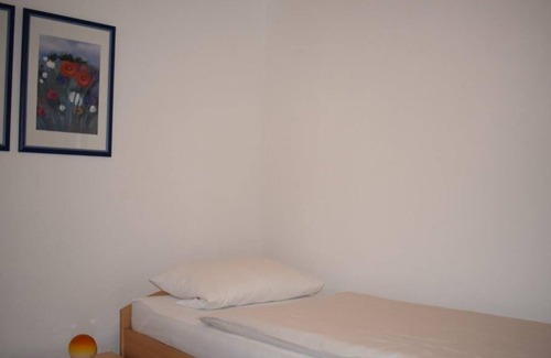 Bergrheinfeld Apartment | Gemütliche Ferienwohung (49qm) mit Balkon und Ausblick über Mainufer