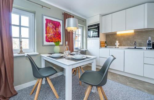 Keitum Apartment | Gemütliche Wohnung unter Reet mit Pool und Sauna in Keitum