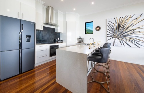 Cannonvale House | Get ready to Shake AND Stir your holiday with this waterfront executive home.