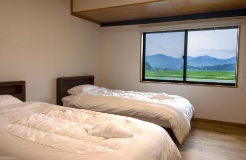 Usa Apartment | GLOCE宇佐 田宮-田んぼのお城- l 美しい田園と山々を一望 癒しと伝統を体感
