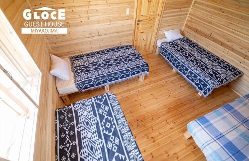 Yonaha House | GLOCE 宮古島 LAPSl 与那覇前浜ビーチまで徒歩5分宮古島の自然と犬に癒されるオーナー同居型ゲストハウス